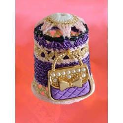 Sac à main sur dé à coudre...