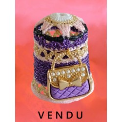 Sac à main sur dé à coudre...